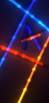 This striking live wallpaper for phone features two vividly colored lights situated on a table
