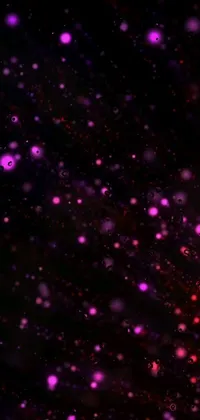 This phone live wallpaper showcases a beautiful red fire hydrant atop a snowy landscape with scattered glowing pink fireflies, set against an abstract black purple studio background with dozens of galaxies