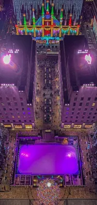This live wallpaper showcases the Rockefeller Center in NYC with a unique aerial view