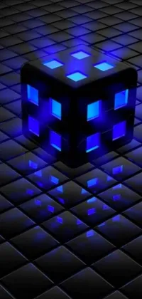 This phone wallpaper boasts a mesmerizing digital rendering of a blue lit cube