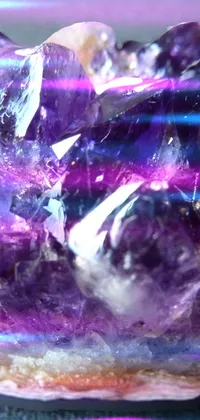 Add a touch of mysticism to your phone's screen with the Purple Crystal Live Wallpaper