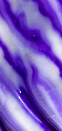 This stunning phone live wallpaper features a close up of a beautiful purple and white marble design