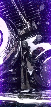 Looking for a live wallpaper that's sleek, edgy, and full of attitude? Look no further than this close-up of a chrome motorcycle engine, captured with a Sony A3 camera