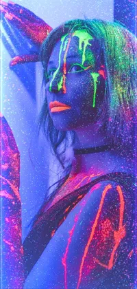 This live wallpaper for your phone features vibrant neon makeup designs with a cyberpunk aesthetic