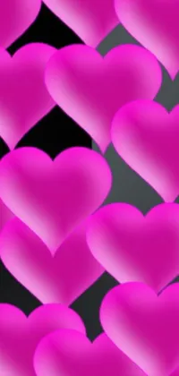 This phone live wallpaper features an eye-catching array of pink hearts set against a sleek black background