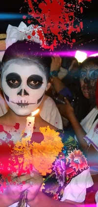 Looking for a lively and colorful phone wallpaper that celebrates the Mexican holiday, Day of the Dead? Look no further than this eye-catching live wallpaper featuring individuals dressed in traditional sugar skull makeup and festive costumes