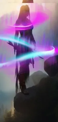 Experience the mystical and fantastical with this phone live wallpaper featuring a Native American shaman concept, magic wands, crystals, and ethereal wisps in swirling radiating colors of pink, purple, and blue neons set against a scenic mountain range with a sunset sky and aurora borealis in the distance