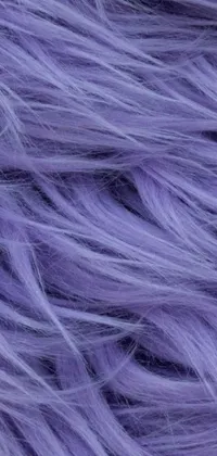 This phone live wallpaper offers a stunningly close-up shot of purple synthetic fur hair, surrounded by delicate white hairs and intricate micro-detail technology