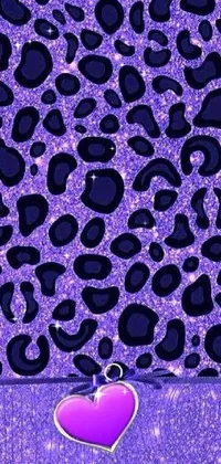 This phone live wallpaper boasts a visually stunning purple and black leopard print pattern, which has been digitally rendered for an eye-catching effect