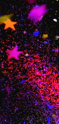 This phone live wallpaper showcases a mesmerizing display of colorful stars and confetti raining from the sky, overlaid with a microscopic photo and a glitter gif