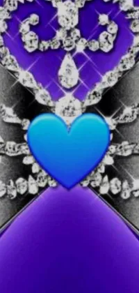 This phone live wallpaper features a blue heart surrounded by sparkling diamonds on a regal purple background