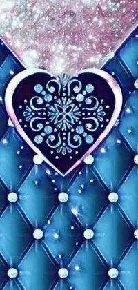 This live phone wallpaper depicts a striking purple heart on a tranquil blue quilt
