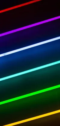 This phone live wallpaper showcases a close-up view of captivating neon lights in a dark room