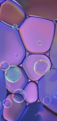 This live wallpaper depicts a unique image of microscopic bubbles floating with breathtaking 3D effects