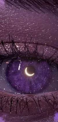 This live phone wallpaper depicts a digital art close-up of an eye, featuring a crescent moon in a moonlit purple sky background