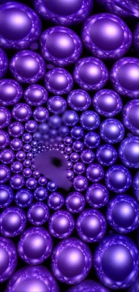 This live phone wallpaper features a stunning fractal mandala design made of purple balls with a jewelry pearl finish and generates infinite generative art of mesmerizing patterns and shapes