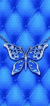 This live wallpaper for your phone showcases a beautiful butterfly close-up set against a gorgeous blue background