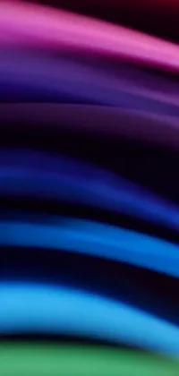 This phone live wallpaper features a unique abstract close-up of multi-colored lines in a blue-purple gradient by Jan Rustem on Unsplash