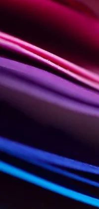 This live wallpaper features stacked colored papers, with a macro photograph captured by Jan Rustem