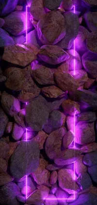 This live wallpaper features a stunning digital rendering of rocks and purple lights