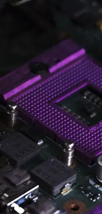 This phone live wallpaper showcases a stunning close-up shot of a purple computer motherboard rendered artistically