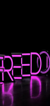 This phone live wallpaper features a dazzling neon sign that reads "freedom" against a black background