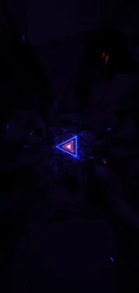 Feast your eyes on this phone live wallpaper featuring a triangular crystalized synapse object set in a darkroom with blue and red lighting