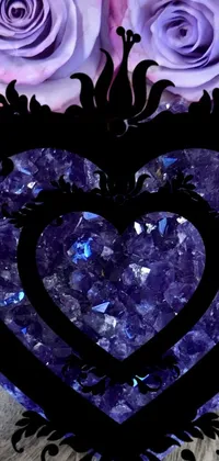 This purple and blue live wallpaper features a stunning crystal heart set amidst a bed of organic crystals and purple roses