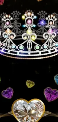 This breathtaking phone live wallpaper portrays a diamond crown, sitting on top of a table, with colorful gems that shimmer and sparkle as you swipe between screens