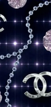 This stunning phone live wallpaper features a diverse collection of elegant and intricate jewelry set against a deep purple background