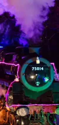 This phone live wallpaper is a mesmerizing portrayal of a train journeying through a luminous forest brimming with bright Christmas lights