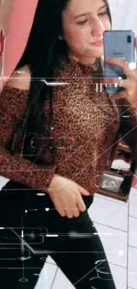 This live phone wallpaper showcases a trendy woman in animal skin clothing taking a mirror selfie with her phone