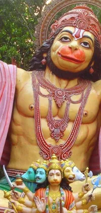 This live wallpaper depicts a close-up of a statue of a man, possibly portraying a legendary warrior or a god-like figure