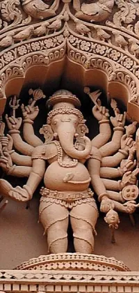 Get this stunning close-up shot of a giant clay statue of Ganesha as a live wallpaper for your phone