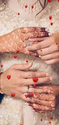 This phone live wallpaper depicts a close-up of a bride's hands adorned with intricate jewelry on her wedding day