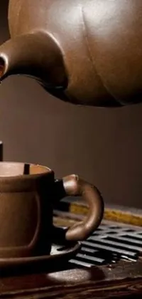 This live wallpaper features a charming tea pot pouring freshly brewed tea into a delicate cup