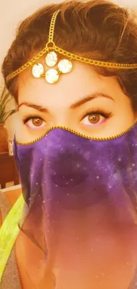 This live wallpaper for your phone showcases an intriguing woman with a purple scarf veiling her face