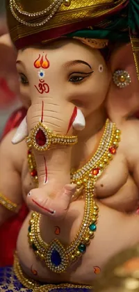 This phone live wallpaper showcases a close-up of a neutral-toned statue of an elephant, depicting Samikshavad, the god of wealth in Hindu mythology