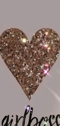 This phone live wallpaper features a striking glitter heart with the empowering word "girlboss" over a taupe-toned picture by Florianne Becker