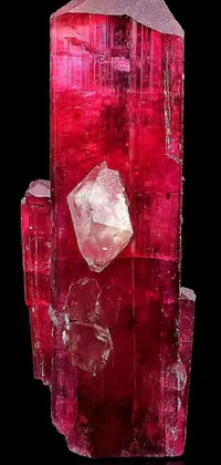 This live wallpaper for your phone features two stunning red elbaite crystals arranged on top of each other