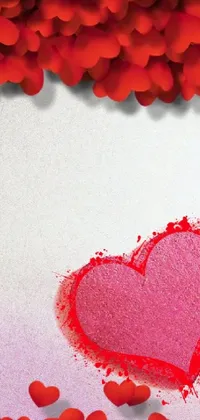 Looking for a romantic live wallpaper for your phone? Look no further than "Paper Heart"! This beautiful design features a handmade heart drawn on a piece of paper, with falling red petals adding a touch of whimsy and romance