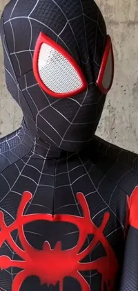 This phone live wallpaper features a close-up of Spider-Man wearing a sleek black and red costume