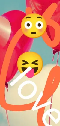 Looking for a fun and unique live wallpaper for your phone? Check out this adorable design featuring two pop art style balloons with expressive faces and a colorful picture in the background