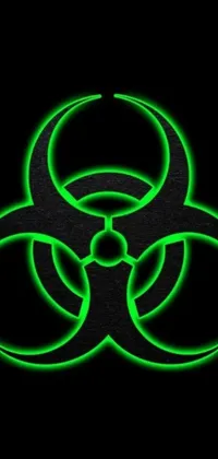 This phone live wallpaper features a striking green biohazard logo against a sleek black background - perfect for fans of biopunk art and pandemic themes
