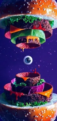This phone wallpaper features two stacked hamburgers and a galaxy in the eye