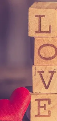 This charming wooden block phone live wallpaper captures the rustic essence of love