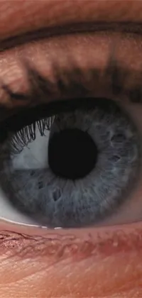Looking for a live wallpaper that will blow your mind? Look no further than this ultra-realistic hyperrealism wallpaper of a blue eye