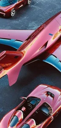This live wallpaper features vintage cars with an airbrush painting in a pink and red color scheme