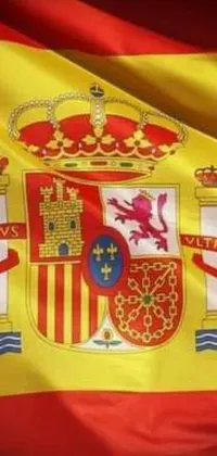 This phone live wallpaper displays the Spanish flag waving in the wind against a background of a throne