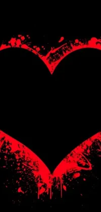 This black and red heart phone live wallpaper presents a stunning black background with a striking heart design in the foreground